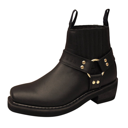 A black, full grain leather harness riding boot with a classic square toe-shape, heavy duty stitching, and a side strap with a buckle.